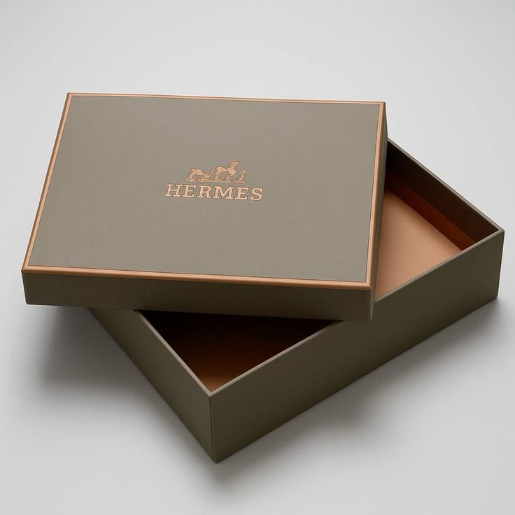 Elegant black gift boxes with black ribbons on a reflective dark surface