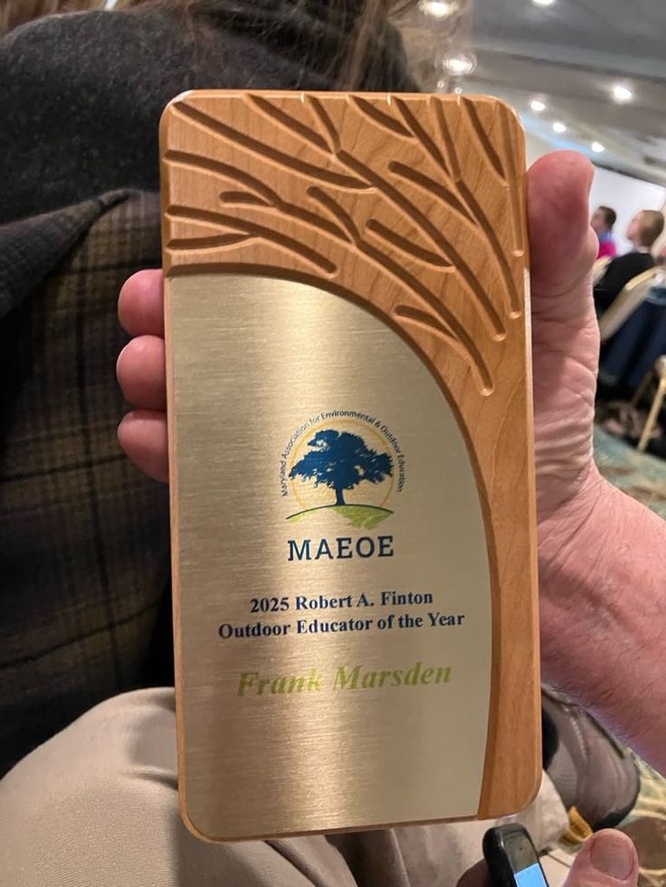 Wooden trophy with sculpted tree and gold detailing